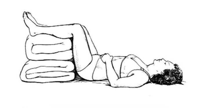 Posture recommandée pour les douleurs lombaires tirantes dans la jambe et la fesse